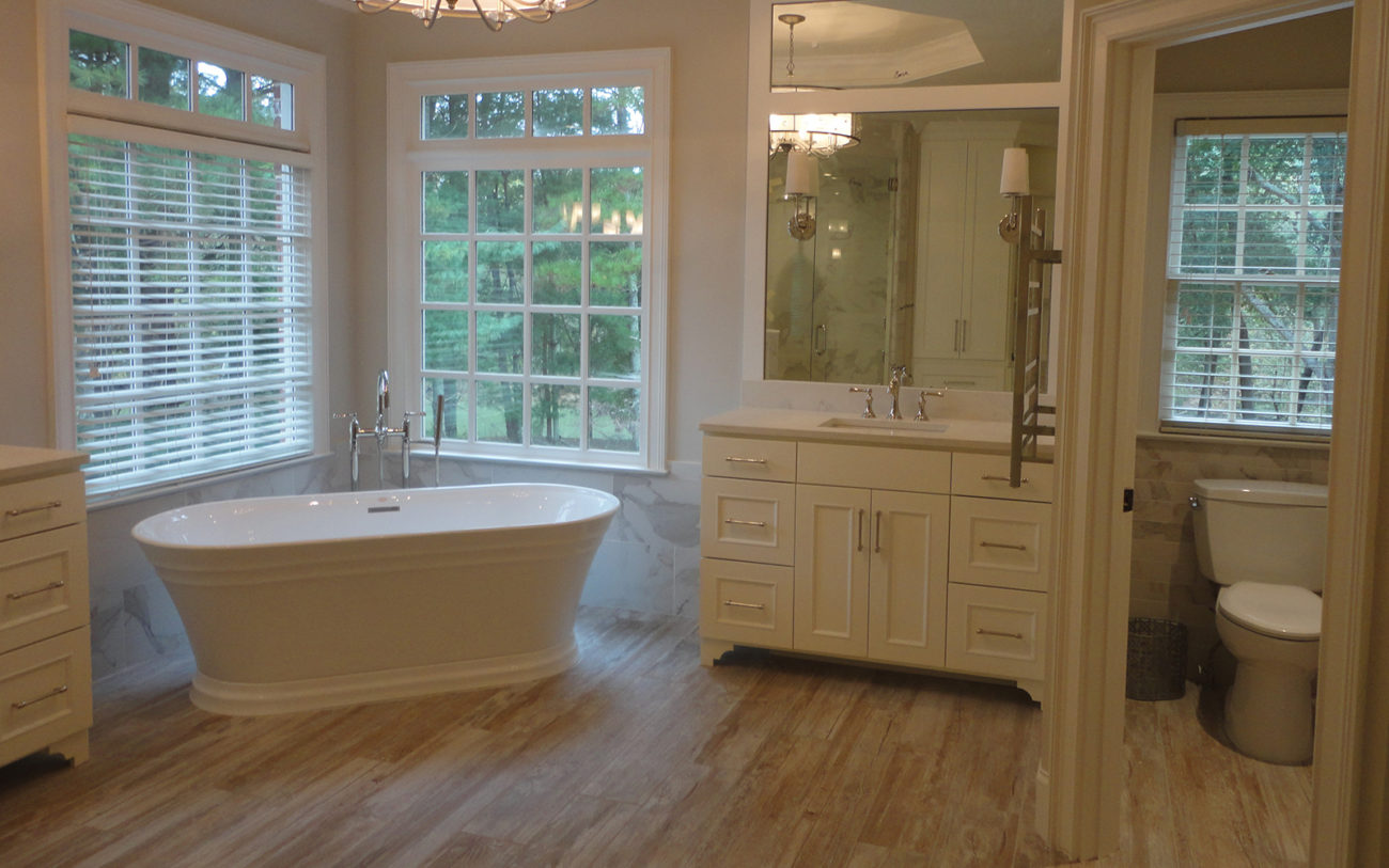 A cozy tub in a remodeled master bathroom