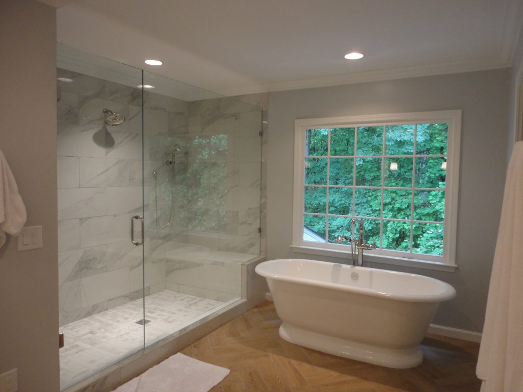 A soaking tub and steam shower in a remodeled bathroom remodeling